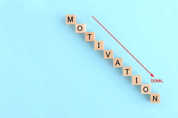 istock Downward motivation graph composed by wooden blocks 1308052825