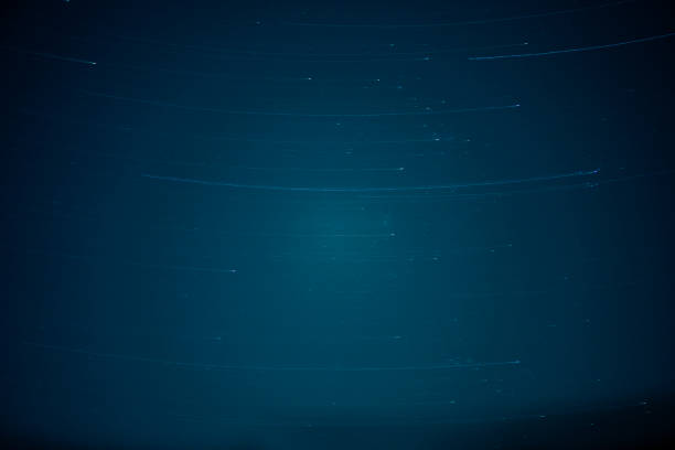Star trails during long exposure of sky at night