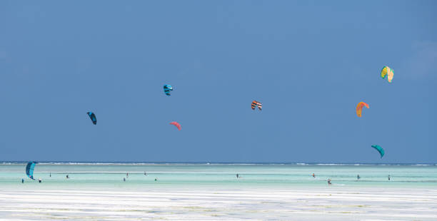Kite Surfer and Instructors on Zanzibar, Tanzania, Africa Kite Surfer and Instructors on Zanzibar, Tanzania, Africa. Nikon z7ii. Converted from RAW. kite sailing stock pictures, royalty-free photos & images