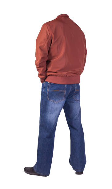 istock dark blue jeans, black leather shoes, jacket isolated on white background. 1308056667