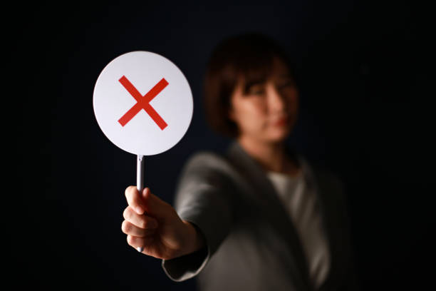 istock × Female employee with a tag 1308058125