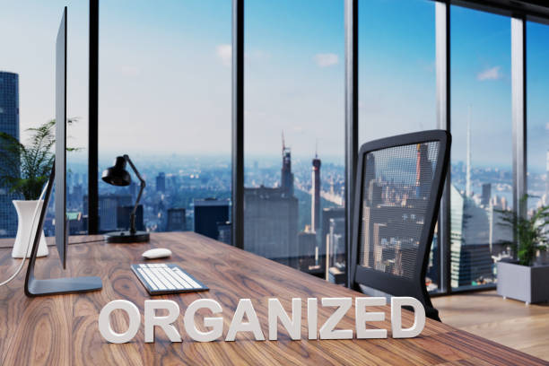 istock organized; office chair in front of modern workspace with computer and skyline view; organization concept; 3D Illustration 1308060076