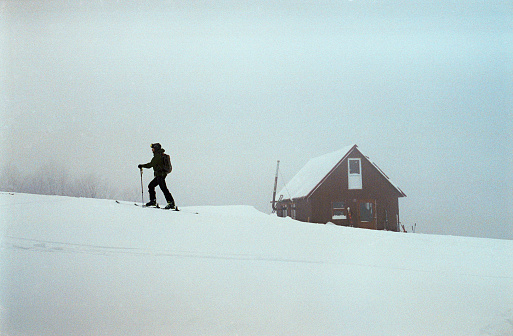Man on ski resort during the blizzard