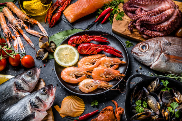 istock Fresh fish and seafood background 1308062036