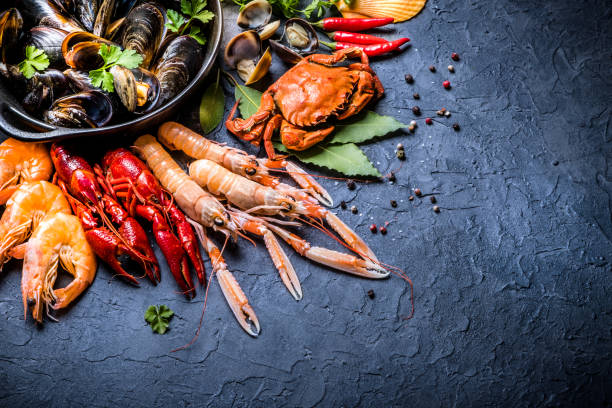 istock Fresh crustaceans and seafood background with copy space 1308066322