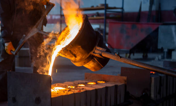 istock molten steel flow, spark burst, casting moment 1308068085
