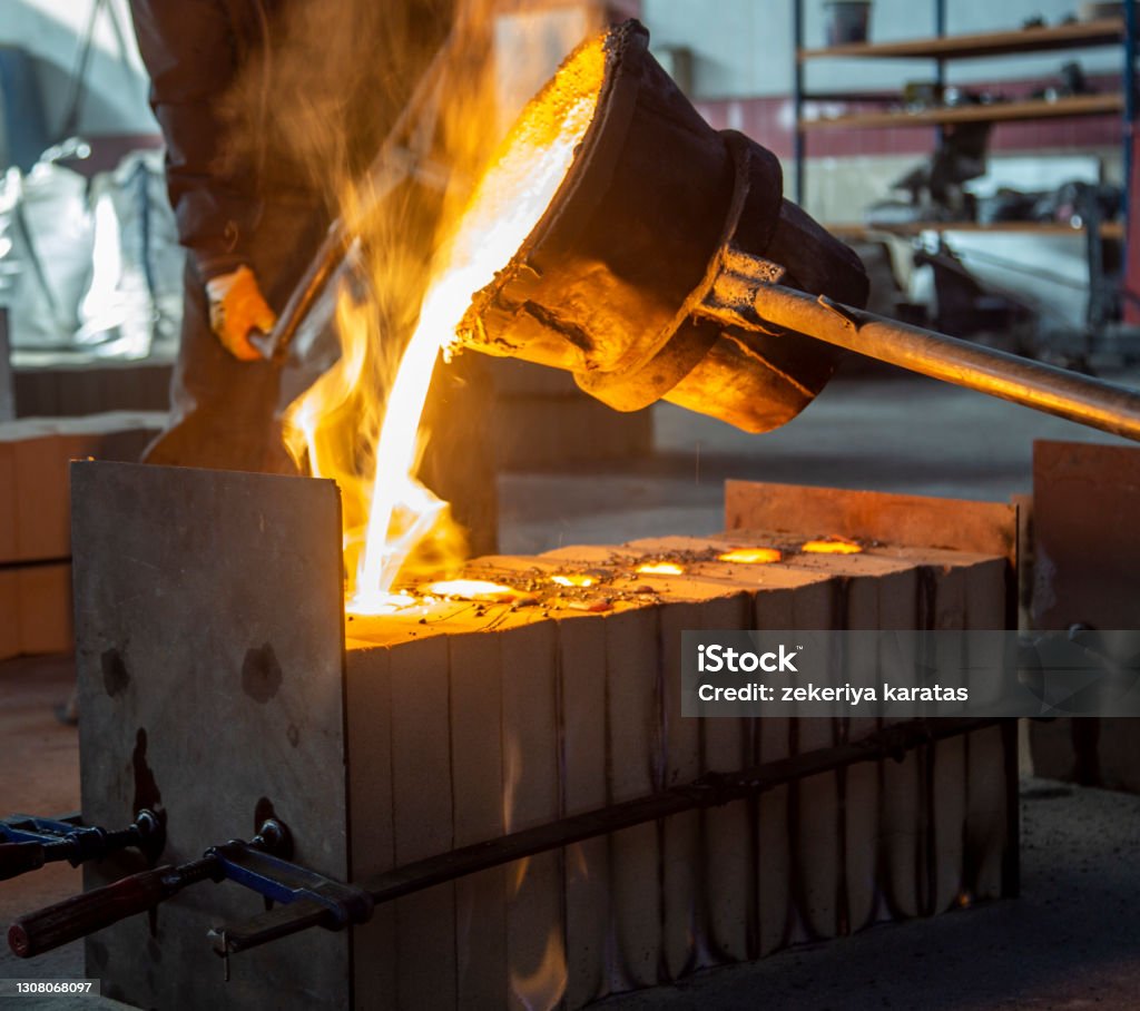 molten steel flow, spark burst, casting moment Aluminum Stock Photo
