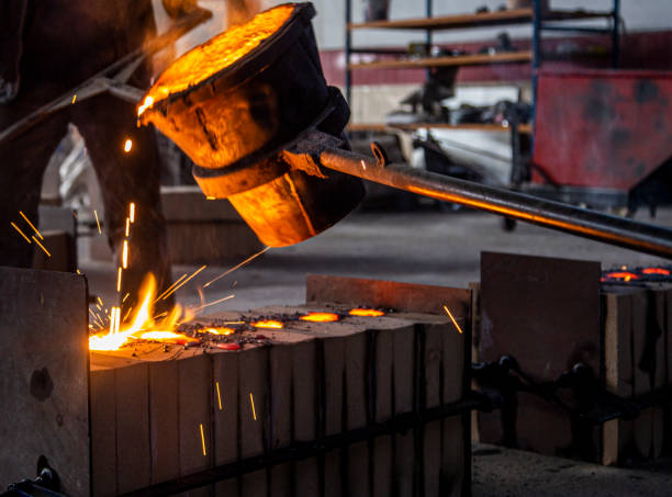 istock molten steel flow, spark burst, casting moment 1308068610