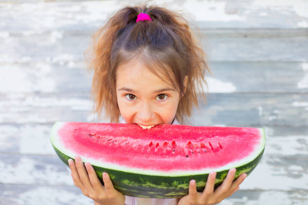 Child eating watermelon