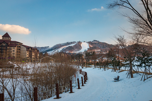 Scenic view of Alpensia Ski Resort against cloudy sky, Pyeongchang, South Korea