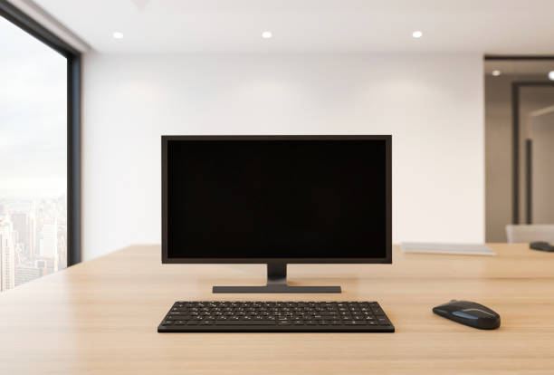 istock Blank computer monitor on office desk 1308074760