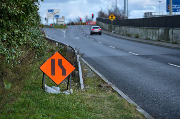 istock Temporary road sign indication road narrowing from right 1308077134