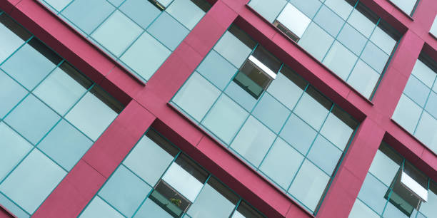 istock fashionable office building architecture with red wall 1308080011