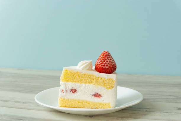 istock strawberry sponge cake on the table. 1308081271