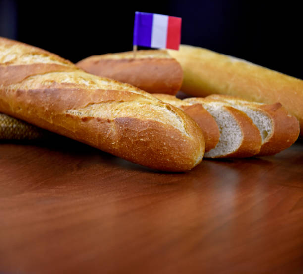 istock French baguettes on the table brown frame stock images 1308084428