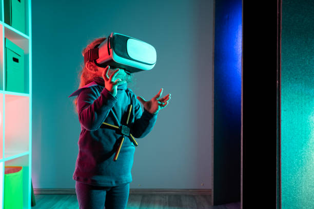istock Child With VR Headset In Fictional Character Suit 1308085438