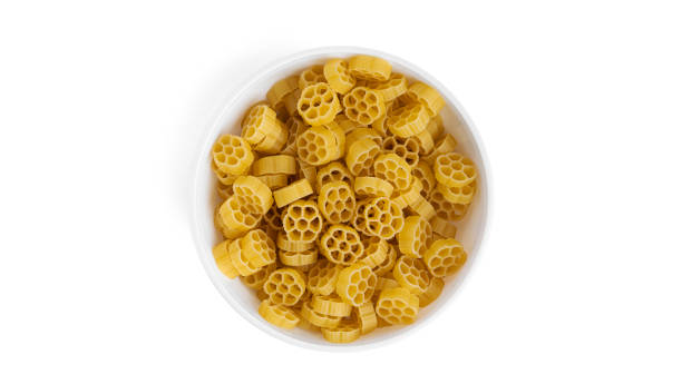 istock Rotelle pasta in white bowl isolated on white background 1308087343