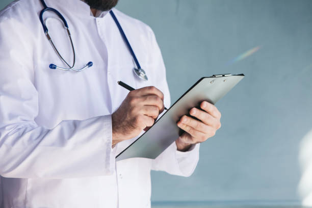 istock Doctor working near window in a hospital 1308088967