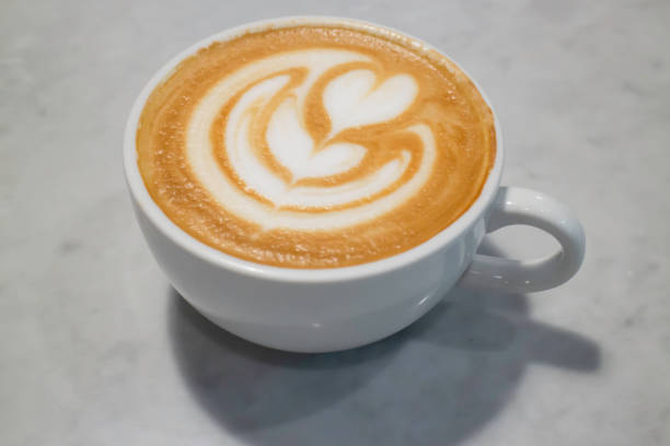 istock A cup of latte on the table 1308089456