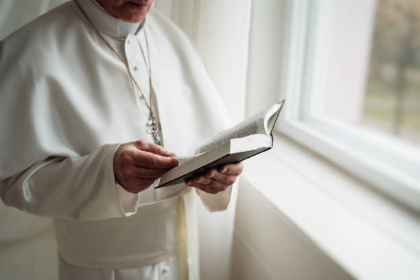 istock Pope reads the Bible 1308090784