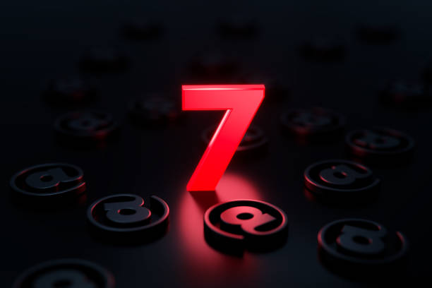 istock Red Number Seven Glowing Amid Black At Symbols On Black Background 1308091718