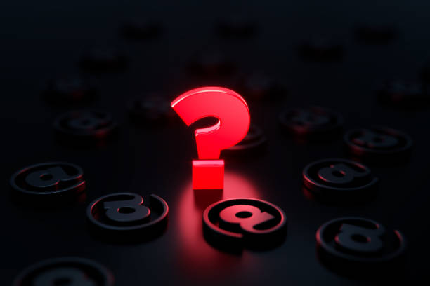 istock Q And A Concept - Question Mark Glowing Amid Black At Symbols On Black Background 1308091865