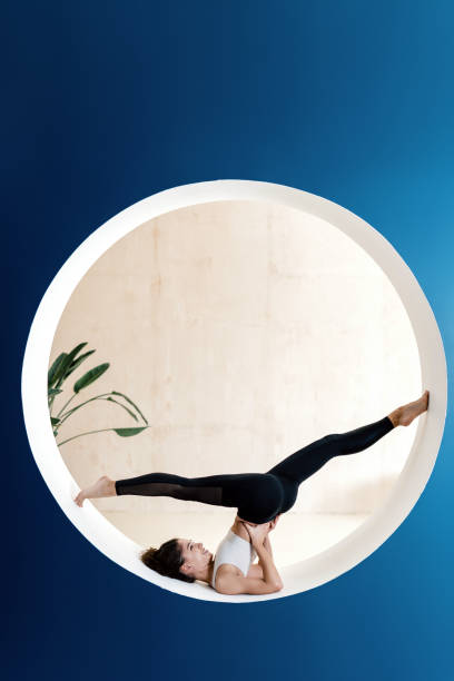 istock Sporty woman training alone in yoga class 1308092633