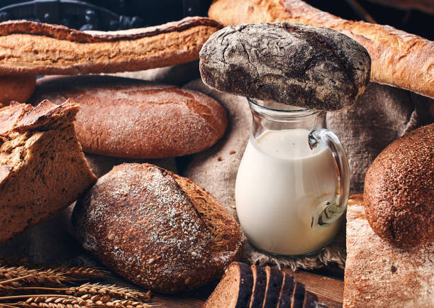 istock Still life with bread and milk in vintage setting 1308092677