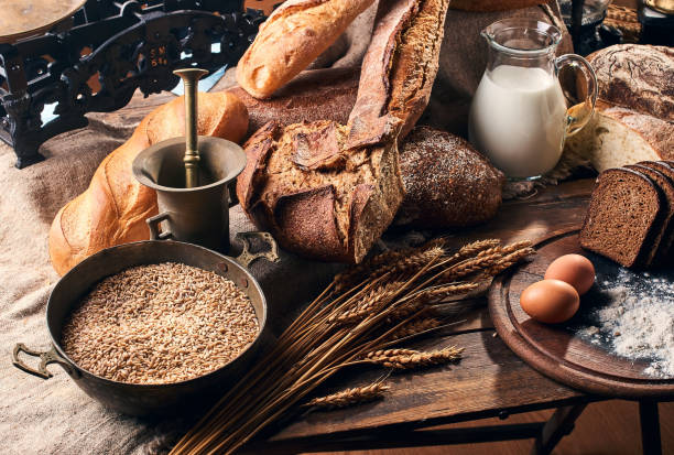 istock Still life with bread and its ingredients in vintage setting. 1308092682