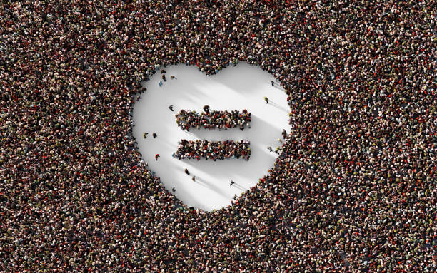 istock Equality Concept - Human Crowd Forming An Equality Symbol Inside Of A Heart Shape : Equality Concept 1308093982