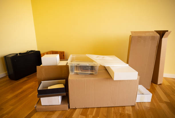 istock Apartment room with cardboard boxes for moving in or moving out whith nobody present 1308094069