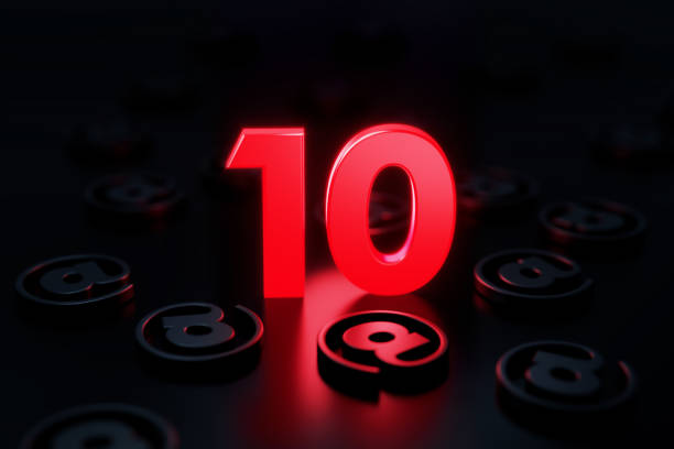 istock Red Number Ten Glowing Amid Black At Symbols On Black Background 1308094071