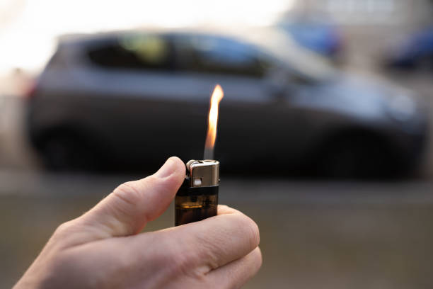 Arsonist Criminal Is About To Set Car On Fire