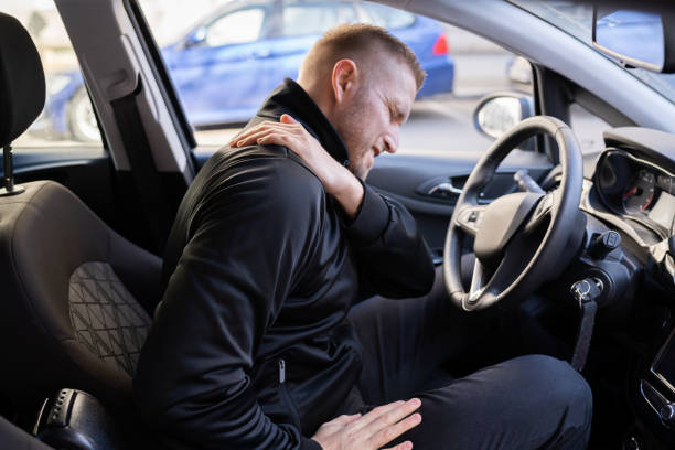 istock Car Driver Back Pain Injury 1308098254
