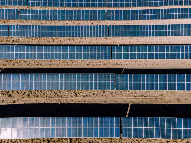 istock Drone Point View of Solar Panels in Desert 1308100318