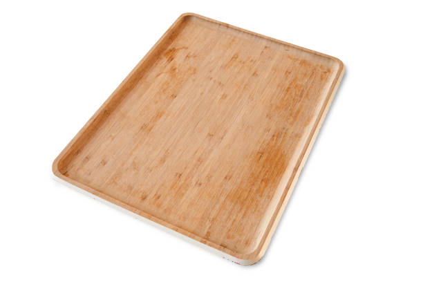 istock Bamboo wooden tray isolated on white with clipping path 1308100354