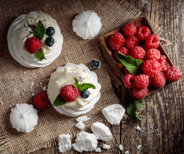 istock Dessert Pavlova with raspberries, blueberries and mint. 1308100926