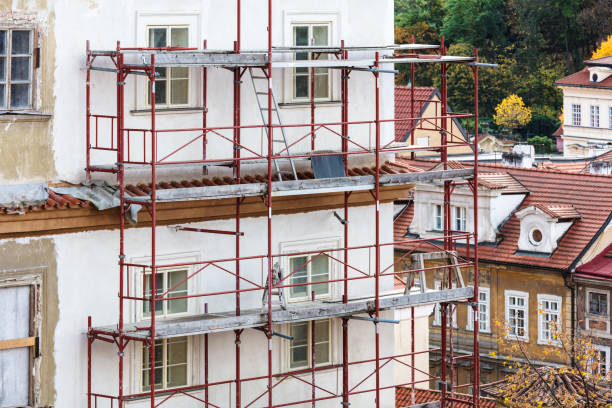istock building facade renovation, house reconstruction, repair 1308102246