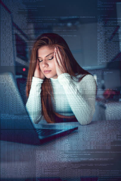 istock Blond Female Focused On Work, Numbers And Charts While Using Laptop In Kitchen 1308102299