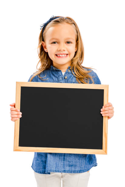 istock Girl holding a chalkboard 1308103638