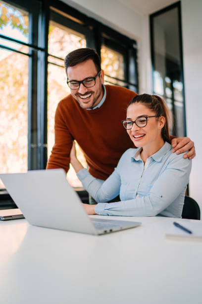 istock Young businesspeople talking with colleagues over video call 1308112538