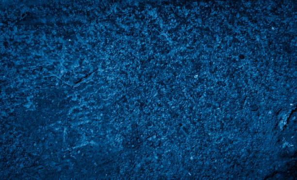 istock macro photo of blue brick with visible texture. background 1308117051