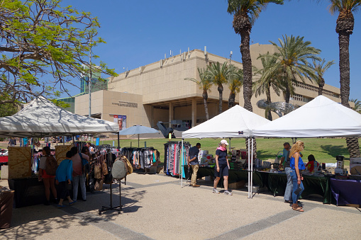 Tel Aviv, Israel, May 6, 2015 - Market stalls on the grounds of Tel Aviv University, some unidentified students in the background.