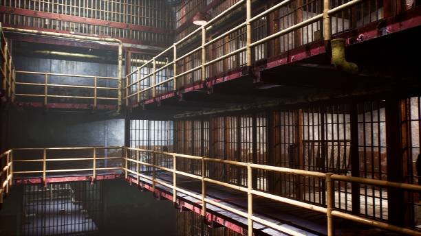 istock A dirty deserted prison with closed cells. View of the old empty prison. 3D Rendering. 1308121538