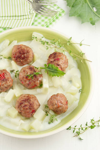 istock Meatballs on kohlrabi vegetables with fresh thyme series image 04 1308126609