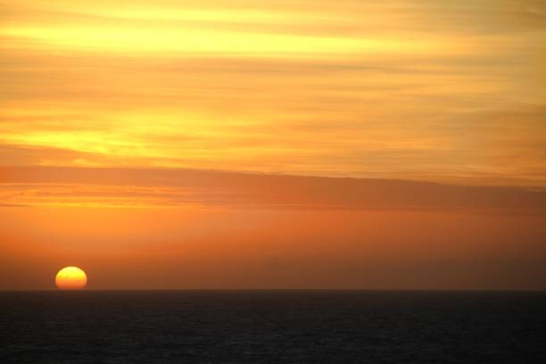 istock Sun Rise over the ocean 1308133179