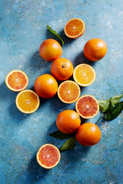 istock Blood oranges, whole and sliced 1308136244