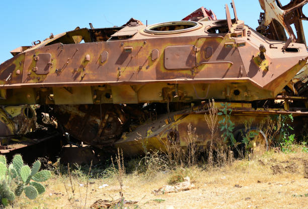 istock Asmara tank graveyard - Soviet BTR-60 APC on top of a T-55 tank, Asmara, Eritrea 1308137134