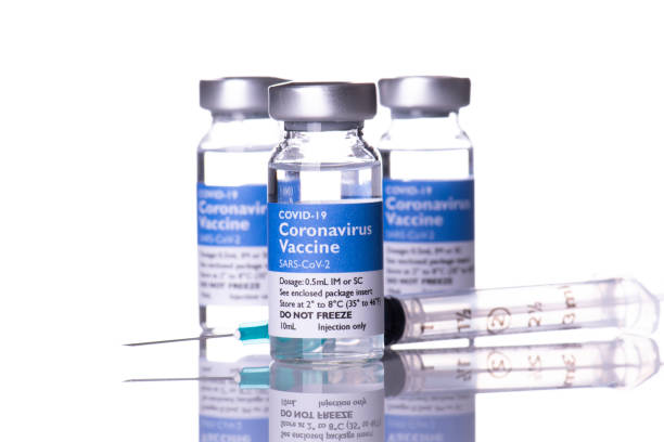 istock 3 coronavirus vaccine vials and hypodermic syringe needle 1308143684