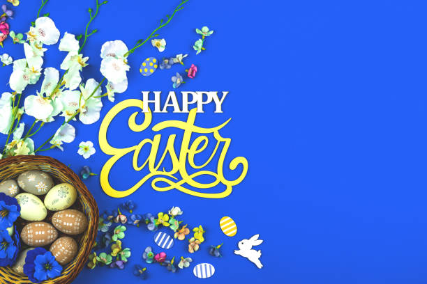 istock Happy Easter background with egg nests and spring flower, blue background and top view 1308146478